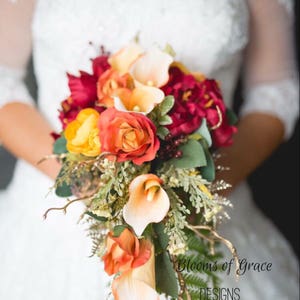 Fall bouquet. Wedding flowers. Orange, red, gold. Includes groom boutonniere.
