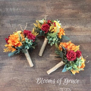 Bridesmaids bouquets , orange fall bouquet. Wedding flowers. Orange, red, gold.
