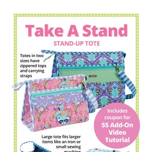 May include: Two zippered totes with carrying straps. The larger tote is pink with a raccoon print and the smaller tote is blue with a floral print. Both totes are open to show the interior. The text "Take A Stand" is at the top of the image. The text "Zippered totes open wide for easy access" is at the bottom of the image.