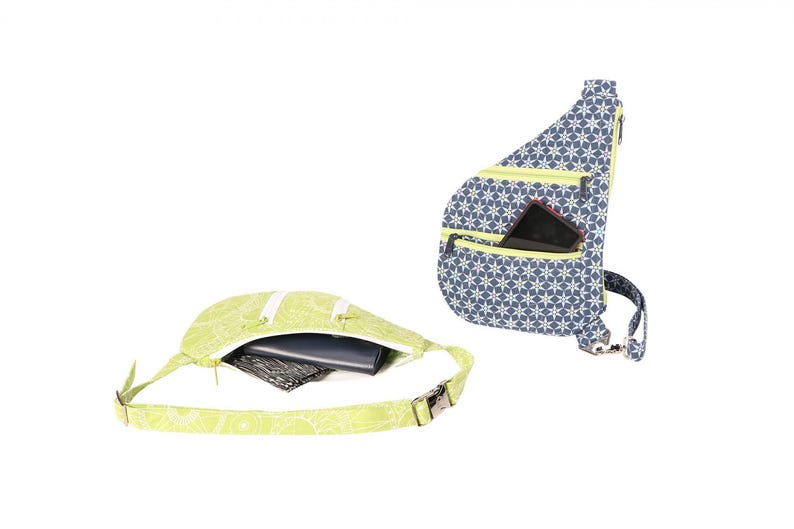 May include: Two crossbody bags with different patterns. The bag on the left is green with a white and green pattern. The bag on the right is blue with a white and blue pattern. Both bags have a zippered pocket on the front.
