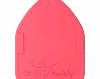 Binding Eaze by Quilted Heartz #652787 silicone mat for pressing binding coral pink