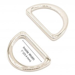 Puede incluir: Dos anillos en D de metal plateados. El anillo m&aacute;s grande tiene un ancho interior de 2,54 cm (1 pulgada).