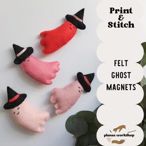 May include: Four felt ghost magnets in shades of red, pink, and light pink, each wearing a black witch hat with a coloured band. The text Print & Stitch Felt Ghost Magnets and planes workshop is visible alongside the ghosts.