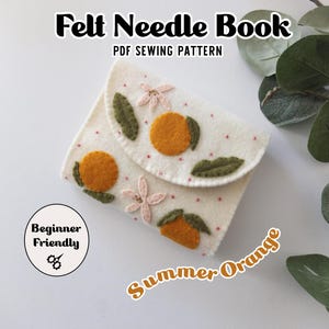 May include: A white felt needle book with orange and green felt applique. The book is decorated with orange slices, leaves, and pink flowers. Text on the image reads "Felt Needle Book PDF Sewing Pattern" and "Summer Orange". A "Beginner Friendly" badge is also present.