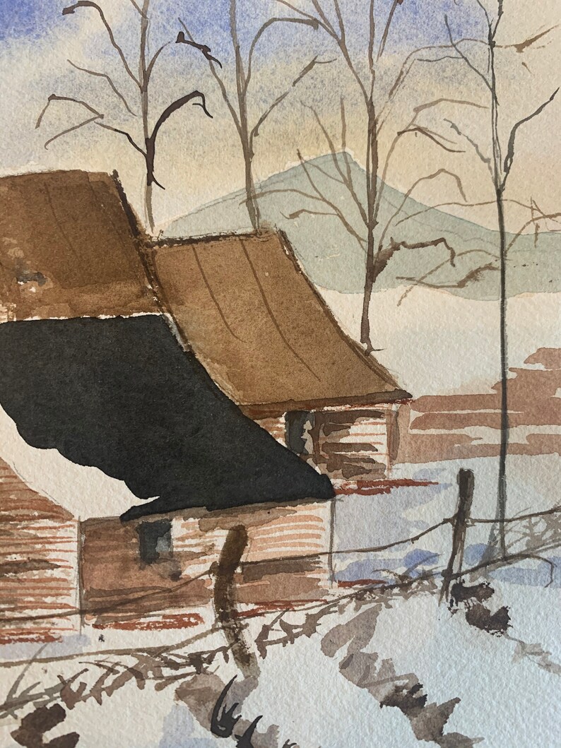May include: Watercolor painting of a winter landscape featuring two rustic buildings with brown roofs and a black roof. Bare trees and a snow-covered ground are visible, with a soft blue and tan sky in the background. A fence runs along the bottom.