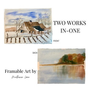 May include: Watercolor painting of a barn in a snowy landscape, with a vineyard in the foreground. The back of the artwork shows a landscape with trees and water. Text reads "TWO WORKS IN-ONE" and "Framable Art by Mulherin Lane."