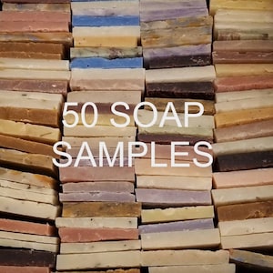 May include: A collection of 50 soap samples in various colors and textures. The soaps are arranged in neat rows, showcasing a diverse palette of hues, including shades of brown, beige, blue, and purple. The text "50 SOAP SAMPLES" is displayed prominently.