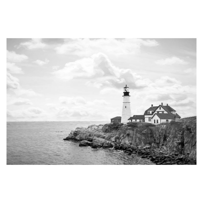 May include: A black and white photograph of a lighthouse on a rocky cliff overlooking the ocean. The lighthouse is tall and white with a black top. There are clouds in the sky.
