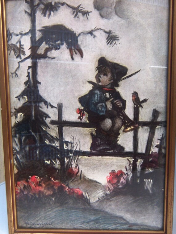 hummel boy on fence with bird