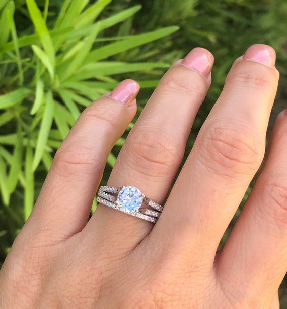 Classic Diamond Halo Engagement Ring with a Subtle Split Ban | Jacqueline's  Fine Jewelry | Morgantown, WV