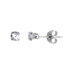 May include: A pair of silver stud earrings with a clear round stone in the center.