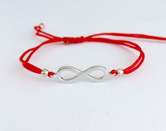 Infinity-armband. Zilveren oneindige armband. Rode koordarmband. Verstelbare rode oneindigheidsarmband met koord. Trendy armband.