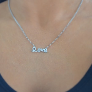 Love necklace. Sterling silver love necklace. Monogram love necklace. Love script cursive love necklace. Kourtney Kardashian love necklace.