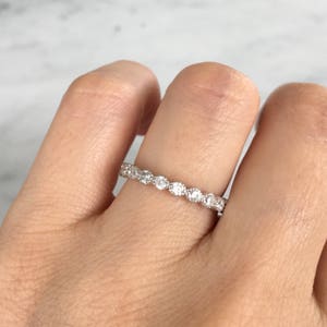 Round cut eternity band ring. Silver eternity ring. Silver eternity band. Silver band. Band ring. Stackable ring. Eternity band ring.
