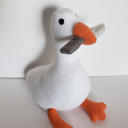 duck plush with a knife