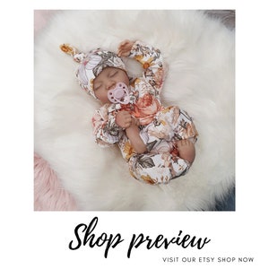 Floral baby romper with matching hat