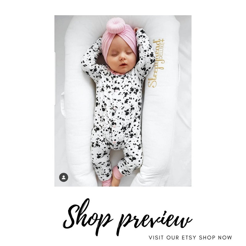 monochrome baby romper with pink baby turban