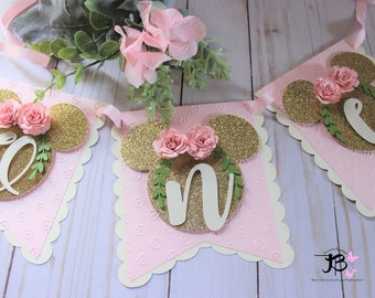 Banner eerste verjaardag Minnie Mouse: roze en goud feestdecoratie
