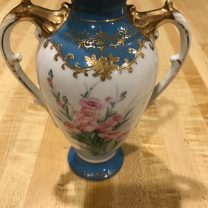 Vintage hand painted vase trimmed in gold