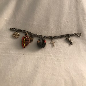 Vintage charm bracelet with hand carved monkey