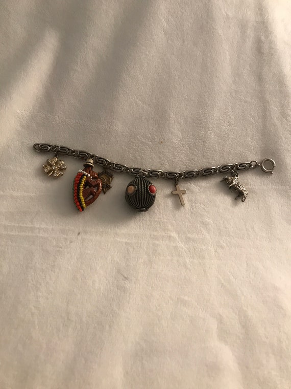 Vintage charm bracelet with hand carved monkey