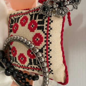 Treasure box features black & red hardanger sachet plus some vintage jewelry