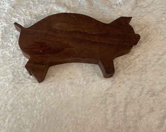 Small handmade walnut pig