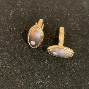 Pair vintage Hickok oval cuff links with rhinestone