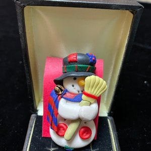 Largeresin snowman with broom