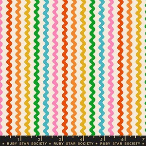 May include: A fabric print featuring vertical wavy lines in alternating colors of pink, orange, yellow, green, and light blue on a cream background. A black ruler at the bottom shows measurements in inches, labeled Ruby Star Society.