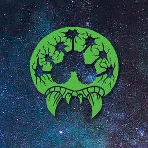May include: A green and black space-themed illustration of a creature with a large head and sharp teeth. The creature's head is shaped like a dome with a pattern of trees inside. The creature is set against a dark blue background with white stars.