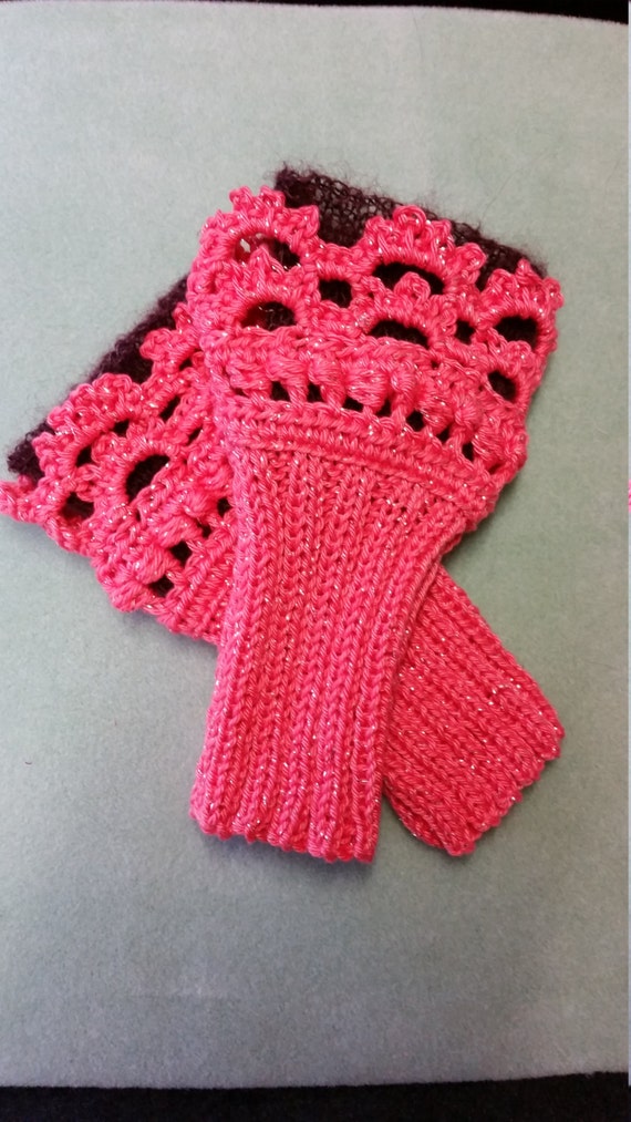 W343.  Wristlets .  Hand knitted wristlets with crochet finish