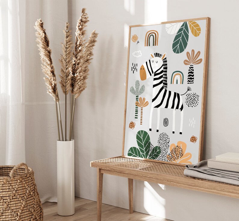 May include: A white and black zebra illustration with a rainbow and green foliage on a light gray background. The illustration is framed in a light wood frame.