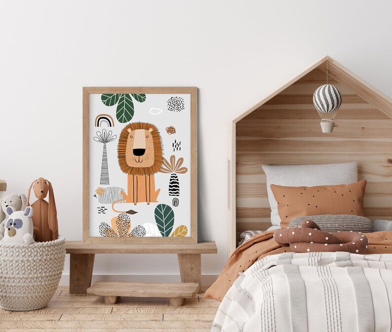 May include: A colorful illustration of a lion with a jungle background. The lion is orange with a brown mane and is sitting in a green jungle with a rainbow and other plants. The illustration is framed in a light brown frame.