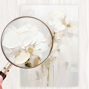 May include: A close-up of a white floral painting with a textured, brushstroke effect. The flowers are painted in shades of white and cream, with hints of gold.