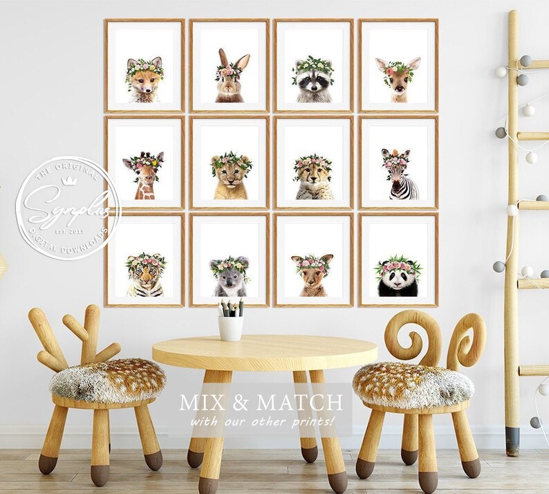 May include: A set of 12 printable nursery art prints featuring various animals wearing flower crowns. The prints are in a grid of 4 rows and 3 columns, with each print framed in a light brown frame. The animals include a fox, rabbit, raccoon, deer, giraffe, lion, zebra, tiger, koala, kangaroo, and panda. The prints are perfect for a nursery or child's room.