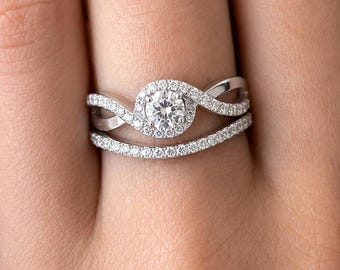 Elegant brudset med CZ-motiv i 925 sterlingsilver, vriden förlovningsring och böjd vigselring