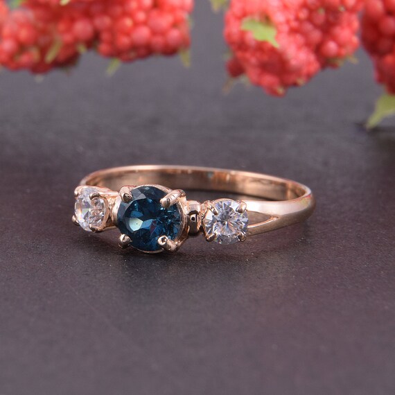 rose gold ring with blue stone