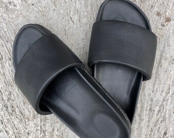 black leather slip ons