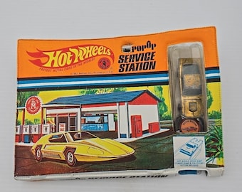 Estación de servicio emergente Hot Wheels de Mattel de 1967 con Mustang Gold Redline.