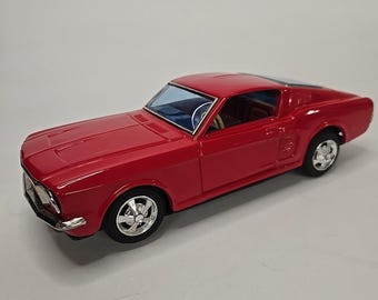 VINTAGE JAPAN Taiyo Bump' n Go Tin Ford Mustang Battery OP Works