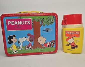 Fiambrera metálica de Charlie Brown de Peanuts de 1973 con termo.