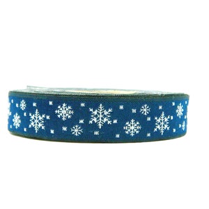 May include: Blue ribbon with a white snowflake pattern.