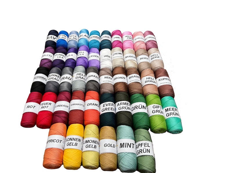 May include: A collection of 40 spools of colorful waxed cotton cord, each with a label indicating the color in German. The colors include red, orange, yellow, green, blue, purple, brown, gray, and black.