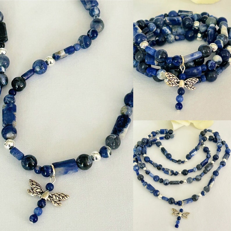 May include: A collection of blue sodalite bead necklaces and bracelets. The jewelry features a variety of bead shapes, including round and rectangular, with silver-colored spacers. A silver dragonfly charm dangles from the necklace and bracelet.
