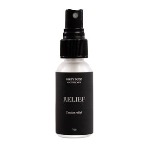 May include: A clear glass bottle with a black spray nozzle and label. The label reads "Dirty Dude Apothecary" and "Relief Tension relief 1 oz".
