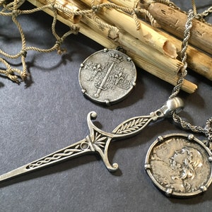 Layering Joan of arc Pendant on a 20” Stainless Steel Necklace and a Large Sword Pendant on a 24” Tarnish Free Silver Rope necklace