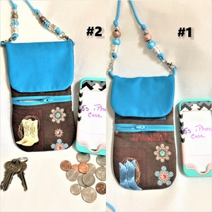 May include: Two turquoise crossbody phone pouches with brown fabric lining featuring a western boot design. Each pouch has a zippered pocket and a beaded strap. The pouches are labelled #1 and #2.