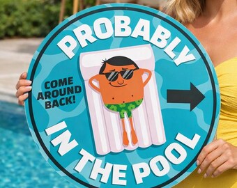 May include: A round blue sign featuring a cartoon character in sunglasses floating on a white raft. The text reads PROBABLY IN THE POOL and COME AROUND BACK with a black arrow pointing right. The design includes a wavy water pattern.