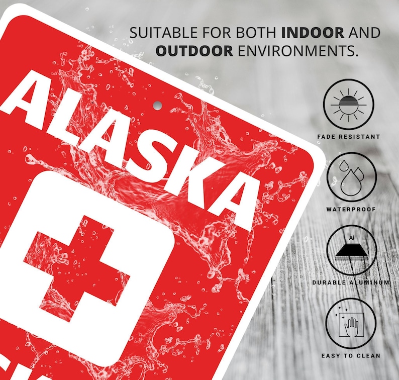 a red and white sign that says alaska on it